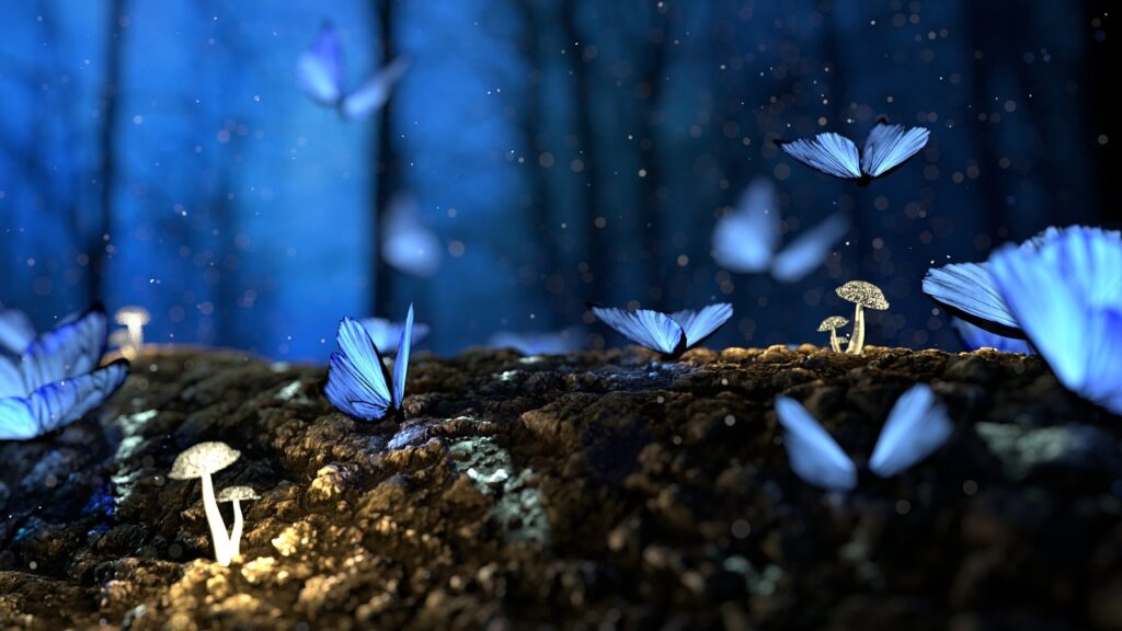 Blaue, im Dunkeln leuchtende Schmetterlinge, machen es sich auf dem Baum bequem