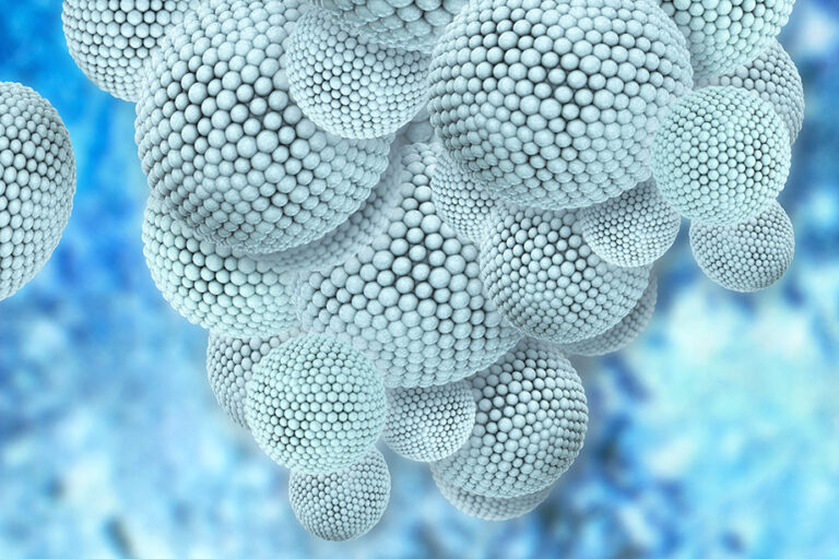Mehrere in blau eingefärbte Nanopartikel sind als 3D-Ansicht dargestellt